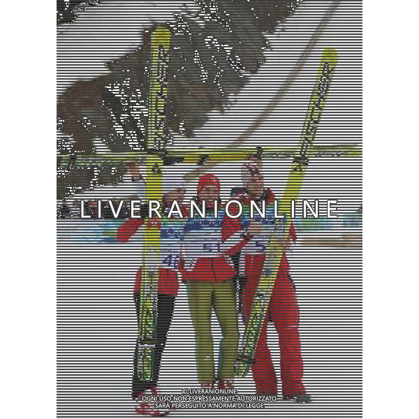 (100213) -- WHISTLER, Feb. 13, 2010 -- Switzerland\'s Simon Ammann (C), Poland\'s Adam Maylsz (L) and Austria\'s Gregor Schlierenzauer pose for photos after men\'s NH individual final of ski jumping at the 2010 Winter Olympic Games in Whistler, Canada, Feb. 13, 2010. Simon Ammann claimed the very first gold medal of Vancouver winter games with 276.5 points. Xu Jiajun) /Agenzia Aldo Liverani Sas - ITALY ONLY - 21mi GIOCHI OLIMPICI INVERNALI OLIMPIADI DI VANCOUVER 2010 (CANADA)