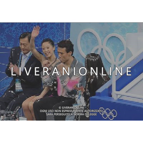 (100214) -- VANCOUVER, Feb. 14, 2010 () -- China\'s Shen Xue (2nd L) /Zhao Hongbo (2nd R) react after the pairs short program of figure skating at the 2010 Winter Olympic Games in Vancouver, Canada, on Feb. 14, 2010. (/Yang Lei) (hy) /Agenzia Aldo Liverani Sas - ITALY ONLY - GIOCHI OLIMPICI INVERNALI - OLIMPIADI VANCOUVER 2010 CANADA
