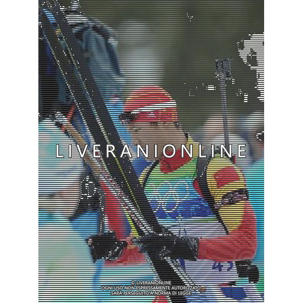 (100214) -- WHISTLER, Feb. 14, 2010 () -- China\'s Zhang Chengye acts after the men\'s 10km sprint final of biathlon at the 2010 Olympic Winter Games in Whistler Olympic Park, Canada, Feb. 14, 2010. Zhang ranked 32nd. (/Chen Kai) (hy) /Agenzia Aldo Liverani Sas - ITALY ONLY - GIOCHI OLIMPICI INVERNALI - OLIMPIADI VANCOUVER 2010 CANADA