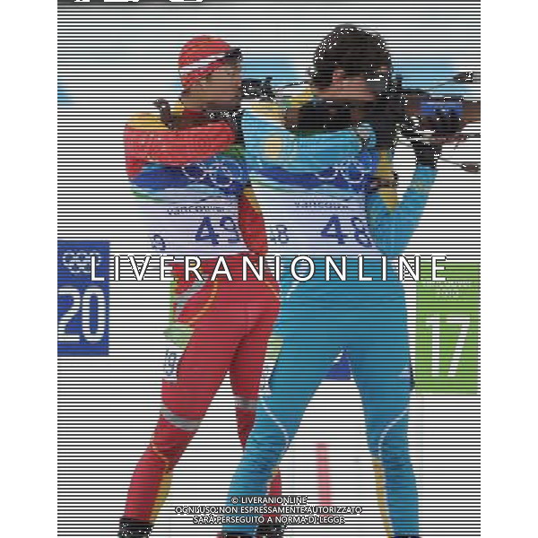 (100214) -- WHISTLER, Feb. 14, 2010 () -- China\'s Zhang Chengye (L) shoots during the men\'s 10km sprint final of biathlon at the 2010 Olympic Winter Games in Whistler Olympic Park, Canada, Feb. 14, 2010. Zhang ranked 32nd. (/Chen Kai) (hy) /Agenzia Aldo Liverani Sas - ITALY ONLY - GIOCHI OLIMPICI INVERNALI - OLIMPIADI VANCOUVER 2010 CANADA