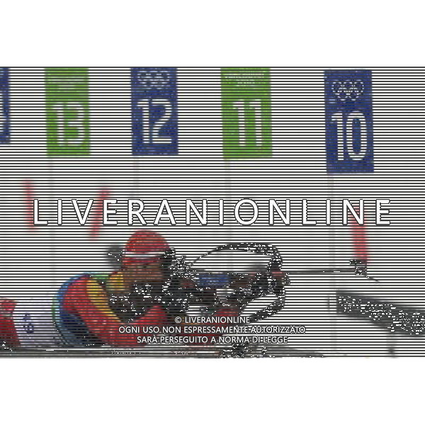 (100214) -- WHISTLER, Feb. 14, 2010 () -- China\'s Zhang Chengye shoots during the men\'s 10km sprint final of biathlon at the 2010 Olympic Winter Games in Whistler Olympic Park, Canada, Feb. 14, 2010. Zhang ranked 32nd. (/Shen Hong) (hy) /Agenzia Aldo Liverani Sas - ITALY ONLY - GIOCHI OLIMPICI INVERNALI - OLIMPIADI VANCOUVER 2010 CANADA