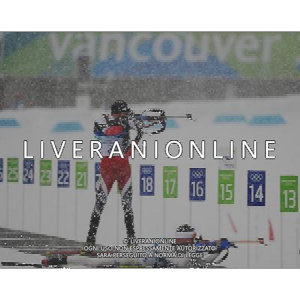 (100214) -- WHISTLER, Feb. 14, 2010 () -- Austria\'s Dominik Landertinger (L) and Finland\'s Paavo Puurunen compete during the men\'s 10km sprint of biathlon at the 2010 Olympic Winter Games in Whistler Olympic Park, Canada, Feb. 14, 2010. (/Shen Hong) /Agenzia Aldo Liverani Sas - ITALY ONLY - GIOCHI OLIMPICI INVERNALI - OLIMPIADI VANCOUVER 2010 CANADA