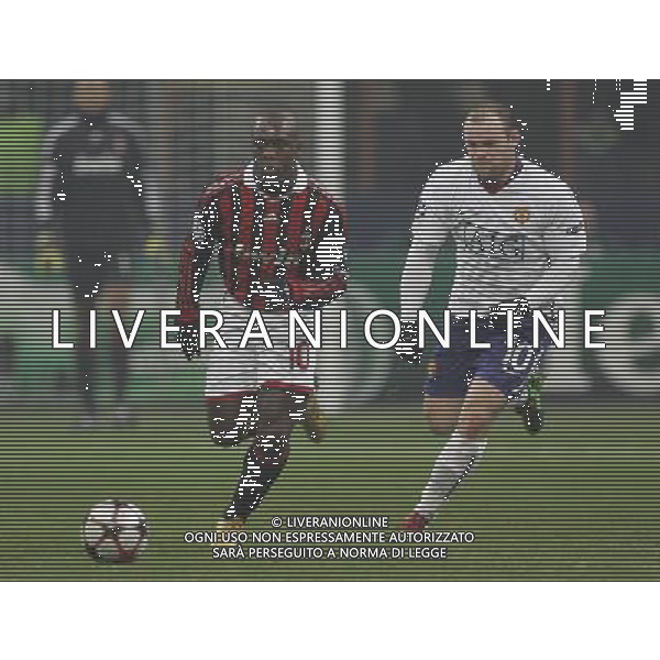 Milano 16-02-2010 Champions League 2009/2010 milan-manchester united 2:3 nella foto wayne rooney e clarence seedorf ph marco luzzani/ag aldo liverani s.a.s.