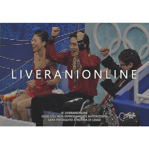 (100215) -- VANCOUVER, Feb. 15, 2010 () -- China\'s Pang Qing (L)/Tong Jian (C) reacts after competing for the pairs free skating of Figure Skating at the 2010 Winter Olympic Games in Pacific Coliseum stadium, Canada, Feb. 15, 2010. Pang Qing/Tong Jian won a silver medal with a total of 213.31 points. (/Chen Xiaowei) /Agenzia Aldo Liverani Sas - ITALY ONLY 21mi GIOCHI OLIMPICI INVERNALI OLIMPIADI DI VANCOUVER 2010 (CANADA) - SPECIALITA\' GARA PATTINAGGIO DI FIGURA DI COPPIA