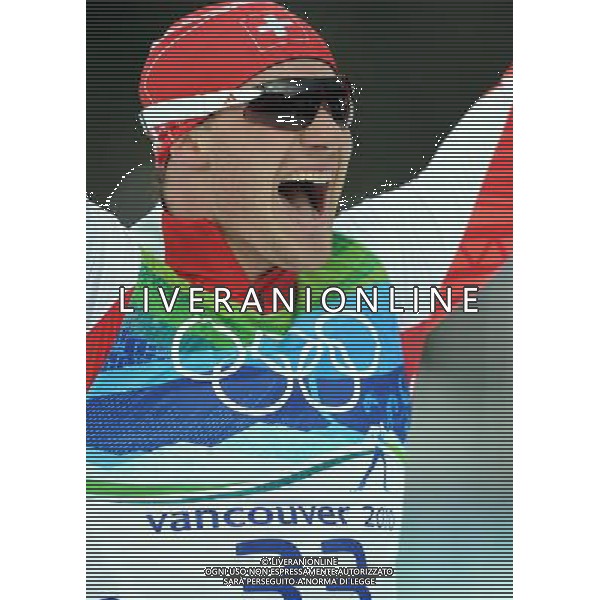 (100215) -- WHISTLER, Feb. 15, 2010 () -- Switzerland\'s Dario Cologna jubilates after the men\'s 15km free of Cross-Country Skiing at the 2010 Winter Olympic Games in Whistler Olympic Park, Canada, Feb. 15, 2010. Dario Cologna won the gold of the event with 33:36.3. (/Chen Kai) /Agenzia Aldo Liverani Sas - ITALY ONLY - 21mi GIOCHI OLIMPICI INVERNALI OLIMPIADI DI VANCOUVER 2010 (CANADA) - SPECIALITA\' GARA MASCHILE CROSS COUNTRY (SCI DI FONDO A TECNICA LIBERA) 15 KM.