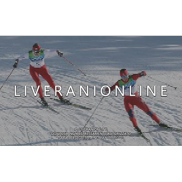 Second placed Justyna Kowalczyk of the Poland (L) and winner Marit Bjoerrgen (R) of Norway in action during the women\'s Individual Sprint Classic Cross Country skiiing final competition at the Vancouver 2010 Olympic Games on 17 February 2010 in Whistler, Canada. /Agenzia Aldo Liverani Sas - ITALY ONLY CANADA: 21mi GIOCHI OLIMPICI INVERNALI OLIMPIADI DI VANCOUVER 2010