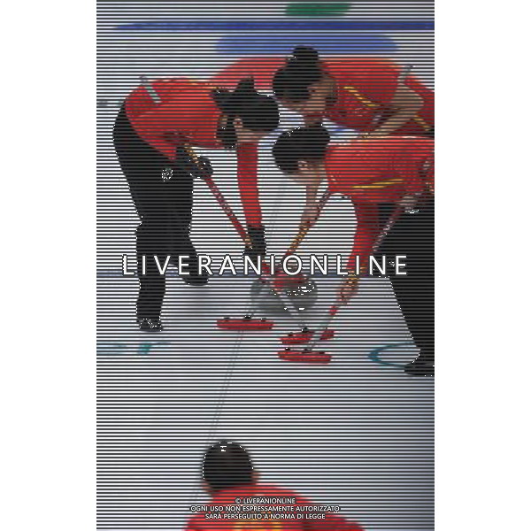 (100217) -- VANCOUVER, Feb. 17, 2010 () -- China\'s Liu Yin, Zhou Yan and Yue Qingshuang (from L to R) brush the ice during the women\'s curling round robin match against Switzerland at the 2010 Winter Olympic Games in the Vancouver, Canada, on Feb. 17, 2010. China won 8-6. (/Qi Heng) (hy) /Agenzia Aldo Liverani Sas - ITALY ONLY CANADA: 21mi GIOCHI OLIMPICI INVERNALI OLIMPIADI DI VANCOUVER 2010