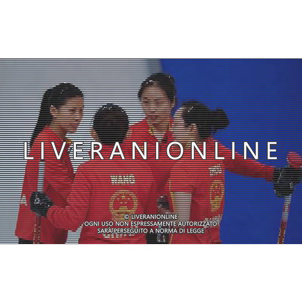 (100217) -- VANCOUVER, Feb. 17, 2010 () -- China\'s Liu Yin, Wang Bingyu, Yue Qing Shuang and Zhou Yan (L-R) communicate during their match against Britain in the 2010 Winter Olympic Games women\'s curling at the Vancouver Olympic Centre, Canada, Feb. 17, 2010. China lost the match 4-5. (/Qi Heng) /Agenzia Aldo Liverani Sas - ITALY ONLY CANADA: 21mi GIOCHI OLIMPICI INVERNALI OLIMPIADI DI VANCOUVER 2010