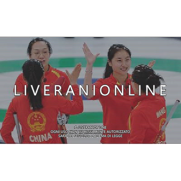 (100218) -- VANCOUVER, Feb. 18, 2010 () -- China\'s Wang Bingyu, Yue Qingshuang, Zhou Yan and Liu Yin (from R to L) celebrate after winning the women\'s curling round robin match against Japan at the 2010 Winter Olympic Games in the Vancouver, Canada, on Feb. 18, 2010. China won 9-5. (/Qi Heng) (hy) /Agenzia Aldo Liverani Sas - ITALY ONLY - CANADA: 21mi GIOCHI OLIMPICI INVERNALI OLIMPIADI DI VANCOUVER 2010