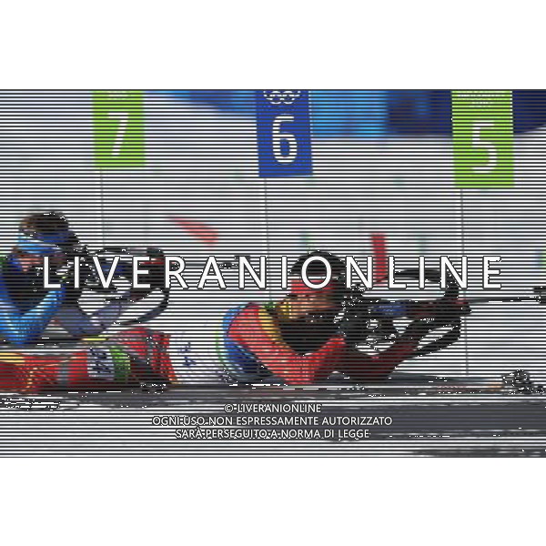 (100218) -- WHISTLER, Feb. 18, 2010 () -- China\'s Zhang Chengye shoots in the men\'s biathlon 20km individual competition at the 2010 Winter Olympic Games in Whistler, Canada, on Feb. 18, 2010. Zhang ranked 19th. (/Shen Hong) (hy) /Agenzia Aldo Liverani Sas - ITALY ONLY - CANADA: 21mi GIOCHI OLIMPICI INVERNALI OLIMPIADI DI VANCOUVER 2010