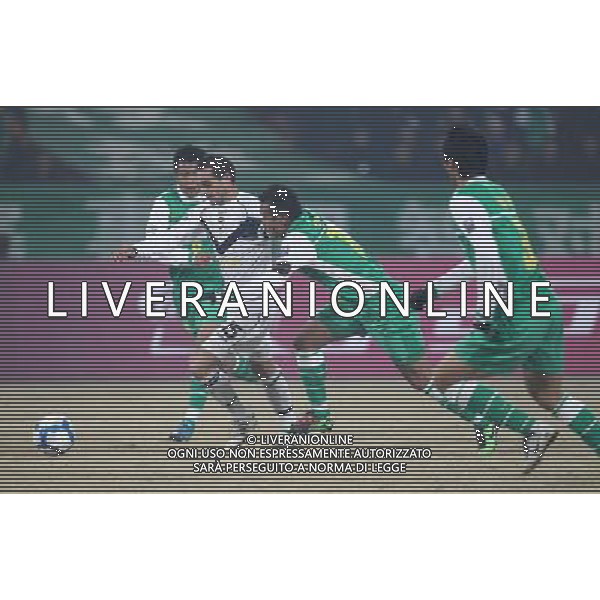 Xu Liang (L #6) and Xu Yunlong ( R2 #13)of Beijing Guoan vies with PONDELJAK TOMISLAV (L2 #15) Australia\'s Melbourne Victory during a Group E match in the AFC Champions League in Beijing , China on Tuesday , Feb 23, 2010.Beijing Guoan won over Melbourne Victory with 1-0.(Photo By Zheng Ze/ColorChinaPhoto) - Ag. Aldo Liverani sas ITALY ONLY PARTITA COPPA CAMPIONI AFC ( Asian Football Confederation - competizione calcistica per squadre di club asiatiche) - Beijing Guoan vs Melbourne Victory
