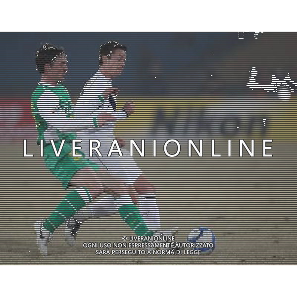 ROSS MAURICE ALEXANDER (L #33) of Beijing Guoan vies with FOSCHINI MATTHEW (R #17) Australia\'s Melbourne Victory during a Group E match in the AFC Champions League in Beijing , China on Tuesday , Feb 23, 2010.Beijing Guoan won over Melbourne Victory with 1-0.(Photo By Zheng Ze/ColorChinaPhoto) - Ag. Aldo Liverani sas ITALY ONLY PARTITA COPPA CAMPIONI AFC ( Asian Football Confederation - competizione calcistica per squadre di club asiatiche) - Beijing Guoan vs Melbourne Victory