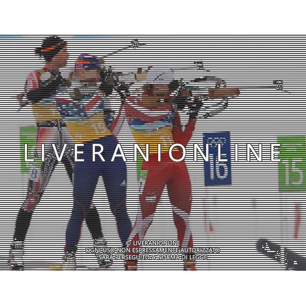 Rosanna Crafword of Canada (L), Johnson Haley(C) of US and Weronika Nowakowska of Poland at the shooting range during the womens 4X6 km relay Biathlon competition at the Vancouver 2010 Olympic Games in Whistler, Canada, 23 February 2010. /Agenzia Aldo Liverani Sas - ITALY ONLY - CANADA: 21mi GIOCHI OLIMPICI INVERNALI OLIMPIADI DI VANCOUVER 2010