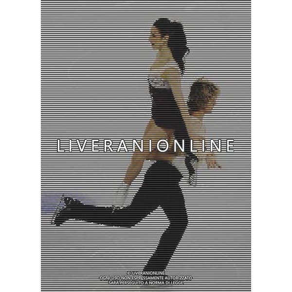 (100222) -- VANCOUVER, Feb. 22, 2010 () -- Meryl Davis (L)/Charlie White of the United States perform during the ice dancing free dance of figure skating at the 2010 Winter Olympic Games in Vancouver, Canada, Feb. 22, 2010. Meryl Davis/Charlie White won the silver medal with a total score of 215.74 points. (/Luo Gengqian) (hy) /Agenzia Aldo Liverani Sas - ITALY ONLY - CANADA: 21mi GIOCHI OLIMPICI INVERNALI OLIMPIADI DI VANCOUVER 2010