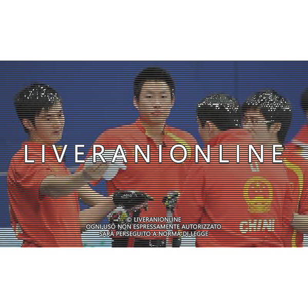 (100222) -- VANCOUVER, Feb. 22, 2010 () -- China\'s Xu Xiaoming, Liu Rui, Li Hongchen and Zang Jialiang (from L to R) discuss during the men\'s curling round robin match against the United States at the 2010 Winter Olympic Games in Vancouver, Canada, Feb. 22, 2010. China won 11-5. (/Chen Kai) (hy) /Agenzia Aldo Liverani Sas - ITALY ONLY - CANADA: 21mi GIOCHI OLIMPICI INVERNALI OLIMPIADI DI VANCOUVER 2010