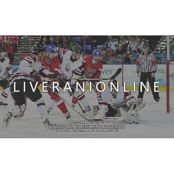 (100223) -- VANCOUVER, Feb. 23, 2010 () -- Latvia\'s goalkeeper (2nd R) saves the ball during the men\'s play-offs qualifications between Latvia and Czech Republic at the 2010 Winter Olympic Games in Vancouver, Canada, Feb. 23, 2010. Latvia lost 2-3. (/Luo Gengqian) (hy) /Agenzia Aldo Liverani Sas - ITALY ONLY - CANADA: 21mi GIOCHI OLIMPICI INVERNALI OLIMPIADI DI VANCOUVER 2010