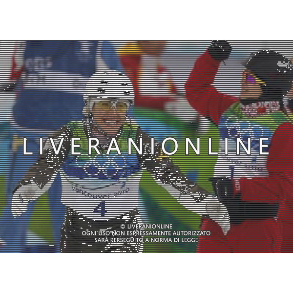 (100224) -- VANCOUVER, Feb. 24, 2010 () -- Australia\'s Lydia Lassila (L) reacts after her final jump during the women\'s aerials final of Freestyle Skiing at the 2010 Winter Olympic Games in Cypress Mountain, Canada, Feb. 24, 2010. Lydia Lassila claimed the title of the event with 214.74 points. (/Han Yan) /Agenzia Aldo Liverani Sas - ITALY ONLY - CANADA: 21mi GIOCHI OLIMPICI INVERNALI OLIMPIADI DI VANCOUVER 2010