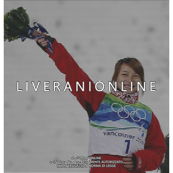 (100224) -- VANCOUVER, Feb. 24, 2010 () -- China\'s Li Nina reacts on the podium during the flower ceremony for the women\'s aerials final of Freestyle Skiing at the 2010 Winter Olympic Games in Cypress Mountain, Canada, Feb. 24, 2010. Li Nina won a silver medal of the event with 207.23 points. (/Han Yan) /Agenzia Aldo Liverani Sas - ITALY ONLY - CANADA: 21mi GIOCHI OLIMPICI INVERNALI OLIMPIADI DI VANCOUVER 2010