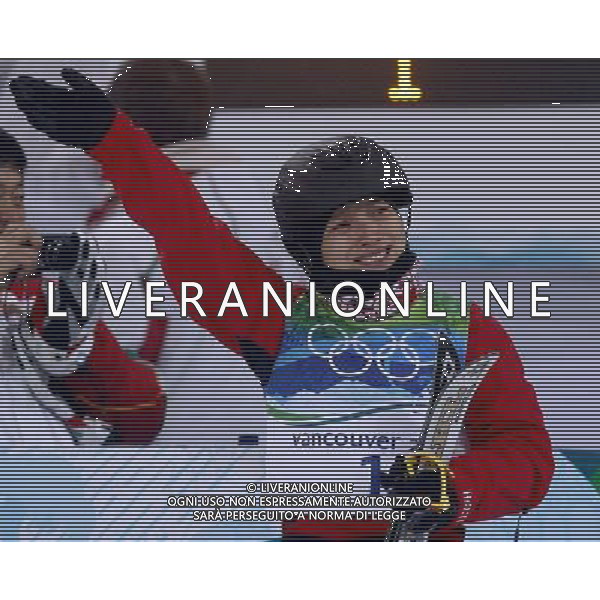 (100224) -- VANCOUVER, Feb. 24, 2010 () -- China\'s Li Nina reacts after her final jump during the women\'s aerials final of Freestyle Skiing at the 2010 Winter Olympic Games in Cypress Mountain, Canada, Feb. 24, 2010. Li Nina won a silver medal of the event with 207.23 points. (/Han Yan) /Agenzia Aldo Liverani Sas - ITALY ONLY - CANADA: 21mi GIOCHI OLIMPICI INVERNALI OLIMPIADI DI VANCOUVER 2010