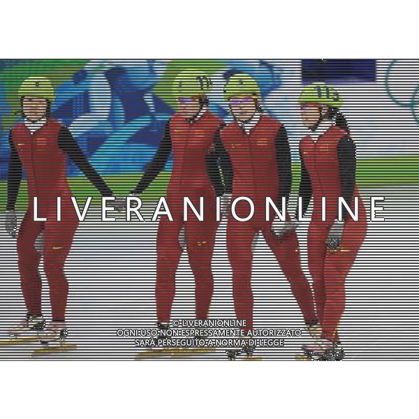 (100224) -- VANCOUVER, Feb. 24, 2010 () -- China\'s Sun Linlin, Zhou Yang, Wang Meng and Zhang Hui (L-R) react while waiting for the final judge after the women\'s 3000m relay final of short track speed skating at the 2010 Winter Olympic Games in Vancouver, Canada, Feb. 24, 2010. China\'s team won the title of the event with a world-record-breaking time 4:06.610. (/Chen Kai) /Agenzia Aldo Liverani Sas - ITALY ONLY - CANADA: 21mi GIOCHI OLIMPICI INVERNALI OLIMPIADI DI VANCOUVER 2010