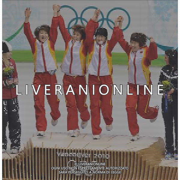 (100224) -- VANCOUVER, Feb. 24, 2010 () -- China\'s Sun Linlin, Wang Meng, Zhang Hui and Zhou Yang react on the podium during the flower ceremony for the women\'s 3000m relay final of short track speed skating at the 2010 Winter Olympic Games in Vancouver, Canada, Feb. 24, 2010. China\'s team won the title of the event with a world-record-breaking time 4:06.610. (/Chen Xiaowei) /Agenzia Aldo Liverani Sas - ITALY ONLY - CANADA: 21mi GIOCHI OLIMPICI INVERNALI OLIMPIADI DI VANCOUVER 2010