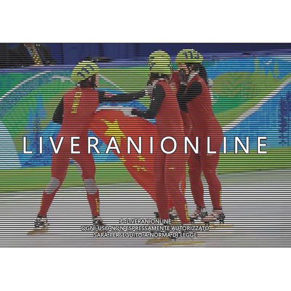 (100224) -- VANCOUVER, Feb. 24, 2010 () -- China\'s skaters celebrate after winning the women\'s 3000m relay final of short track speed skating at the 2010 Winter Olympic Games in Vancouver, Canada, Feb. 24, 2010. China\'s team won the title of the event with a world-record-breaking time 4:06.610. (/Chen Kai) /Agenzia Aldo Liverani Sas - ITALY ONLY - CANADA: 21mi GIOCHI OLIMPICI INVERNALI OLIMPIADI DI VANCOUVER 2010