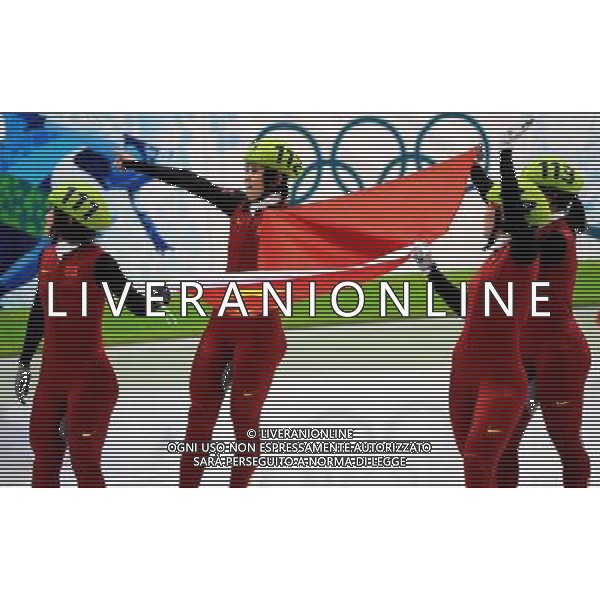 (100224) -- VANCOUVER, Feb. 24, 2010 () -- China\'s Sun Linlin, Wang Meng, Zhou Yang and Zhang Hui (L-R) celebrate after the women\'s 3000m relay final of short track speed skating at the 2010 Winter Olympic Games in Vancouver, Canada, Feb. 24, 2010. China\'s team won the title of the event with a world-record-breaking time 4:06.610. (/Shen Hong) /Agenzia Aldo Liverani Sas - ITALY ONLY - CANADA: 21mi GIOCHI OLIMPICI INVERNALI OLIMPIADI DI VANCOUVER 2010