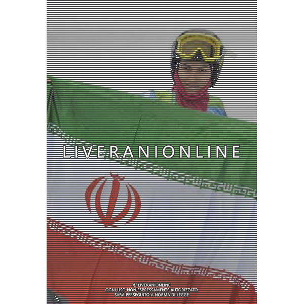 (100224) -- WHISTLER, Feb. 24, 2010 () -- Iran\'s Marjan Kalhor displays her national flag after the women\'s Giant Slalom 1st run of Alpine Skiing at the 2010 Winter Olympic Games in Whistler, Canada, Feb. 24, 2010. Due to the weather, the second round of the event was postponed to Thursday. (/Wu Wei) /Agenzia Aldo Liverani Sas - ITALY ONLY - CANADA: 21mi GIOCHI OLIMPICI INVERNALI OLIMPIADI DI VANCOUVER 2010