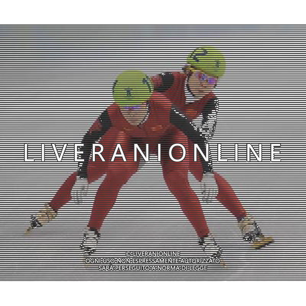 (100224) -- VANCOUVER, Feb. 24, 2010 () -- China\'s Zhou Yang (front) and Wang Meng compete during the women\'s 3000m relay final of short track speed skating at the 2010 Winter Olympic Games in Vancouver, Canada, Feb. 24, 2010. China\'s team won the title of the event with a world-record-breaking time 4:06.610. South Korea\'s team was disqualified. (/Yang Lei) /Agenzia Aldo Liverani Sas - ITALY ONLY - CANADA: 21mi GIOCHI OLIMPICI INVERNALI OLIMPIADI DI VANCOUVER 2010