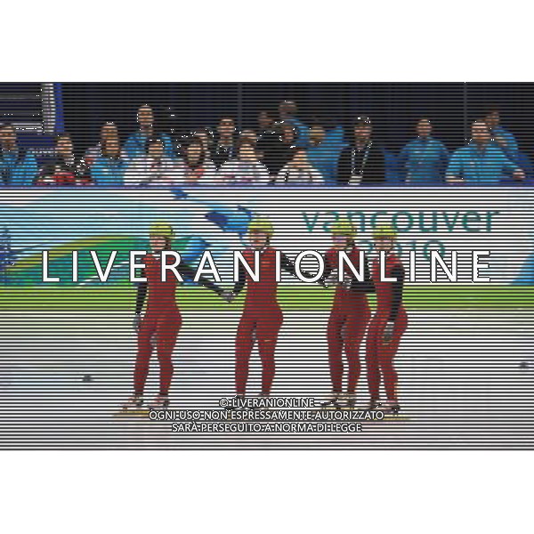 (100224) -- VANCOUVER, Feb. 24, 2010 () -- China\'s Sun Linlin, Zhou Yang, Wang Meng and Zhang Hui wait for the final judge after the women\'s 3000m relay final of short track speed skating at the 2010 Winter Olympic Games in Vancouver, Canada, Feb. 24, 2010. China\'s team won the title of the event with a world-record-breaking time 4:06.610. South Korea\'s team was disqualified. (/Yang Lei) /Agenzia Aldo Liverani Sas - ITALY ONLY - CANADA: 21mi GIOCHI OLIMPICI INVERNALI OLIMPIADI DI VANCOUVER 2010