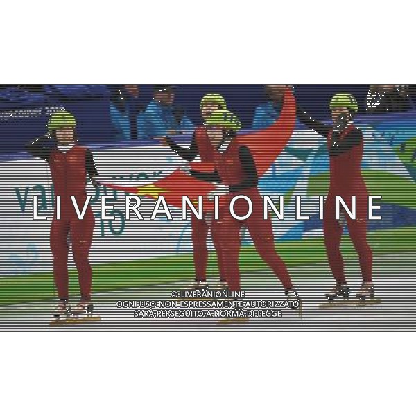 (100224) -- VANCOUVER, Feb. 24, 2010 () -- China\'s Sun Linlin, Wang Meng, Zhou Yang and Zhang Hui (L-R) celebrate after the women\'s 3000m relay final of short track speed skating at the 2010 Winter Olympic Games in Vancouver, Canada, Feb. 24, 2010. China\'s team won the title of the event with a world-record-breaking time 4:06.610. (/Chen Xiaowei) /Agenzia Aldo Liverani Sas - ITALY ONLY - CANADA: 21mi GIOCHI OLIMPICI INVERNALI OLIMPIADI DI VANCOUVER 2010