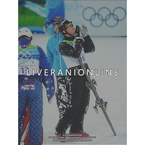 (100225) -- VANCOUVER, Feb. 25, 2010 () -- Alexei Grishin of Belarus reacts after the men\'s aerials final of Freestyle Skiing at the 2010 Winter Olympic Games in Cypress Mountain, Canada, Feb. 25, 2010. Alexei Grishin claimed the title of the event with 248.41 points. (/Xu Jiajun) /Agenzia Aldo Liverani Sas - ITALY ONLY - CANADA: 21mi GIOCHI OLIMPICI INVERNALI OLIMPIADI DI VANCOUVER 2010