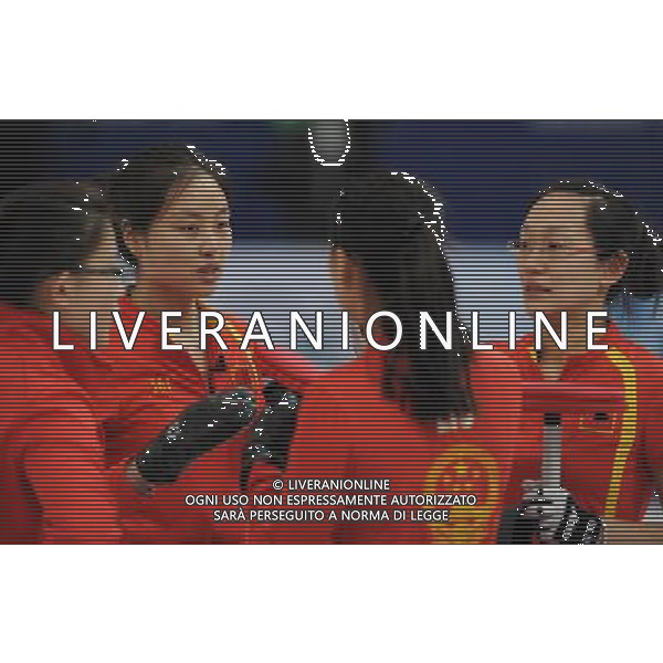 (100225) -- VANCOUVER, Feb. 25, 2010 () -- China\'s Wang Bingyu, Yue Qingshuang, Liu Yin and Zhou Yan (from L to R) discuss during the women\'s curling semifinal against Sweden at the 2010 Winter Olympic Games in Vancouver, Canada, Feb. 25, 2010. China lost 4-9 and was disqualified for the final. (/Yang Lei) (hy) /Agenzia Aldo Liverani Sas - ITALY ONLY - CANADA: 21mi GIOCHI OLIMPICI INVERNALI OLIMPIADI DI VANCOUVER 2010