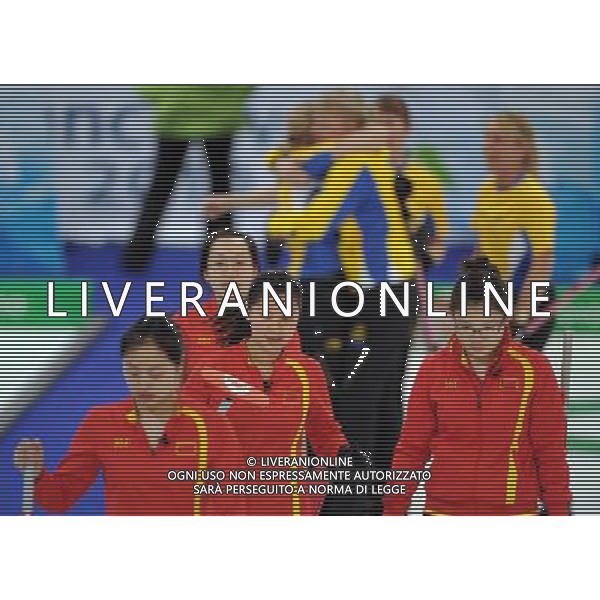 (100225) -- VANCOUVER, Feb. 25, 2010 () -- China\'s Wang Bingyu, Liu Yin, Zhou Yan and Yue Qingshuang (from R to L) react after the women\'s curling semifinal against Sweden at the 2010 Winter Olympic Games in Vancouver, Canada, Feb. 25, 2010. China lost 4-9 and was disqualified for the final. (/Xu Jiajun) (hy) /Agenzia Aldo Liverani Sas - ITALY ONLY - CANADA: 21mi GIOCHI OLIMPICI INVERNALI OLIMPIADI DI VANCOUVER 2010