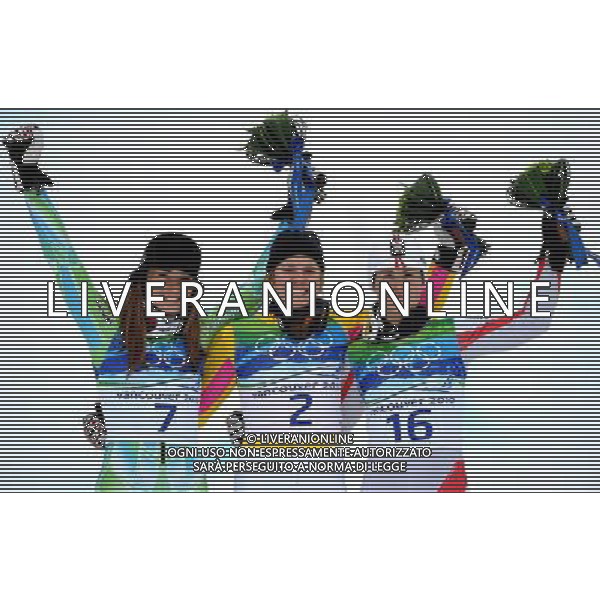 (100225) -- WHISTLER, Feb. 25, 2010 () -- Germany\'s Viktoria Rebensburg (C), Slovenia\'s Tina Maze (L) and Austria\'s Elisabeth Goergl reacts on the podium during the flower ceremony for the women\'s giant slalom of Alpine Skiing at the 2010 Winter Olympic Games in Whistler, Canada, Feb. 25, 2010. Viktoria Rebensburg claimed the title of the event with a total time of 2 minutes and 27.11 seconds. (/Chen Kai) /Agenzia Aldo Liverani Sas - ITALY ONLY - CANADA: 21mi GIOCHI OLIMPICI INVERNALI OLIMPIADI DI VANCOUVER 2010