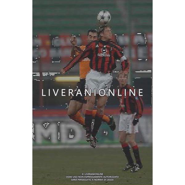 Milano 14/01/2004 coppa italia TIM CUP 2003/04 milan-roma 2:1 nella foto ambrosini e dellas ph marco luzzani/ag aldo liverani s.a.s.