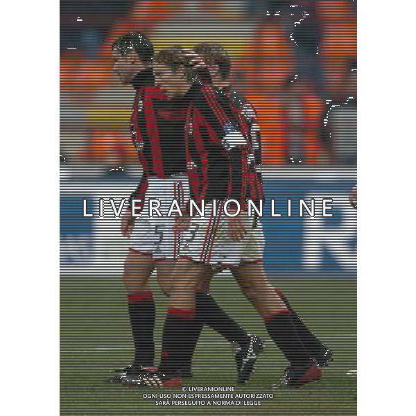 Milano 14/01/2004 coppa italia TIM CUP 2003/04 milan-roma 2:1 nella foto ambrosini esulta con redondo ph marco luzzani/ag aldo liverani s.a.s.