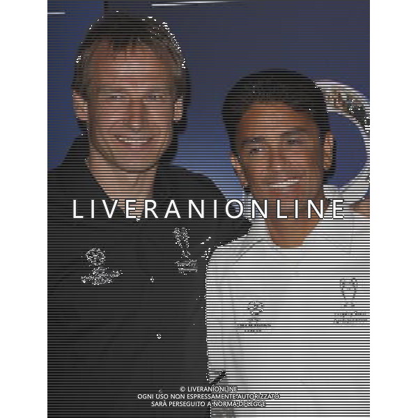 16 March 2010 - Hollywood, California - JŸrgen Klinsmann and JosŽ Roberto Gama de Oliveira ÔBebetoÕ. Heineken is Importing The Revered UEFA Champions League Soccer Trophy to America held At Les Deux. Photo Credit: Kevan Brooks/AdMedia /Agenzia Aldo Liverani Sas - ITALY ONLY - TOUR DEL TROFEO DELLA COPPA CAMPIONI