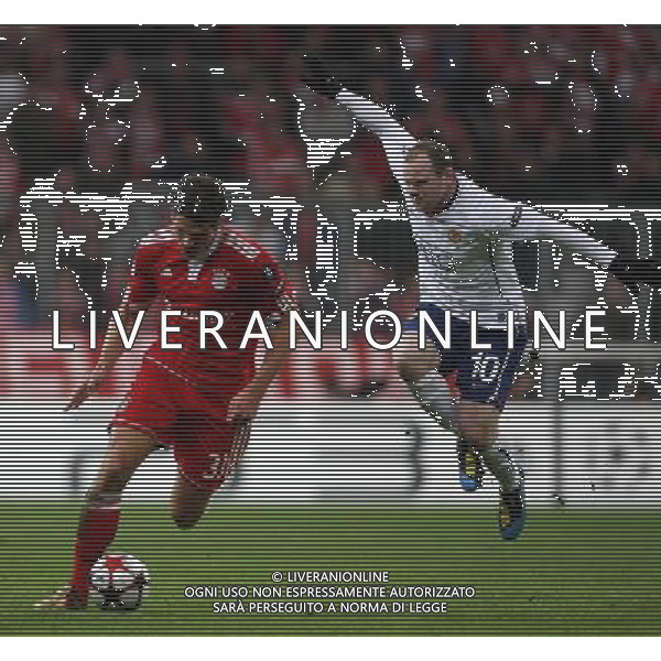 CHAMPIONS LEAUGUE BAYERN MONACO MANCHESTER UNITED QUARTI DI FINALE CALCIO Fussball, 30.03.2010, International, UEFA Champions League, Saison 2009/2010, 1/4-Finale, Hinspiel FC Bayern MŸnchen - Manchester United, 2 : 1 nella foto Mario Gomez- Wayne Rooney ph.firo/AG ALDO LIVERANI SAS - only italy