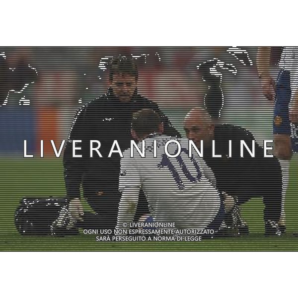 CHAMPIONS LEAUGUE BAYERN MONACO MANCHESTER UNITED QUARTI DI FINALE CALCIO Fussball, 30.03.2010, International, UEFA Champions League, Saison 2009/2010, 1/4-Finale, Hinspiel FC Bayern MŸnchen - Manchester United, 2 : 1 nella foto l\'infortunio di Wayne Rooney ph.firo/AG ALDO LIVERANI SAS - only italy