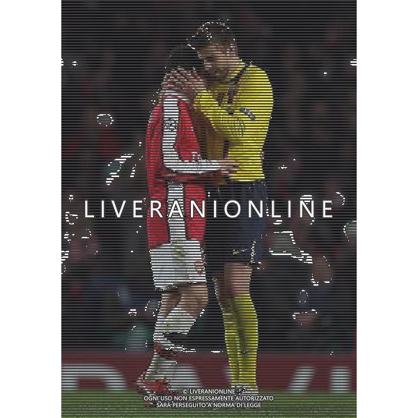 Arsenal - Barcellona quarti finale andata Champions League - fine gara Scenes after final whistle: Arsenal\'s Cesc Fabregas (captain) and Barcelona\'s Gerard Pique : Arsenal vs Barcelona for the UCL 1/4 of Finals at the Emirates Stadium in London on 31/03/2010 Picture By Marcello Pozzetti ©IPS Photo Agency/Agenzia Aldo Liverani Sas - ITALY ONLY -