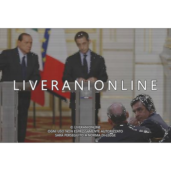 (100410) -- PARIS, April 10, 2010 -- French Prime Minister Francois Fillon (R) is seen during a press conference of France-Italy Summit at the Elysee Palace, Paris, capital of France, April 9, 2010. Italian Prime Minister Silvio Berlusconiand French President Nicolas Sarkozy presided the signing of 20 agreements, letter of intents and joint declarations on Friday. Zhang Yuwei) (msq) /Agenzia Aldo Liverani Sas - ITALY ONLY -
