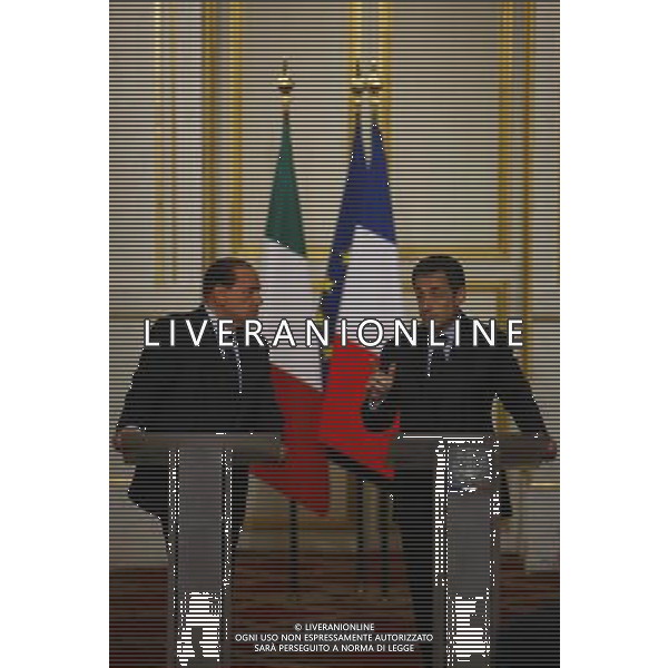 (100410) -- PARIS, April 10, 2010 -- Italian Prime Minister Silvio Berlusconi (L) and French President Nicolas Sarkozy attend the press conference of France-Italy Summit at the Elysee Palace, Paris, capital of France, April 9, 2010. The two leaders presided the signing of 20 agreements, letter of intents and joint declarations on Friday. Zhang Yuwei) (msq) /Agenzia Aldo Liverani Sas - ITALY ONLY -