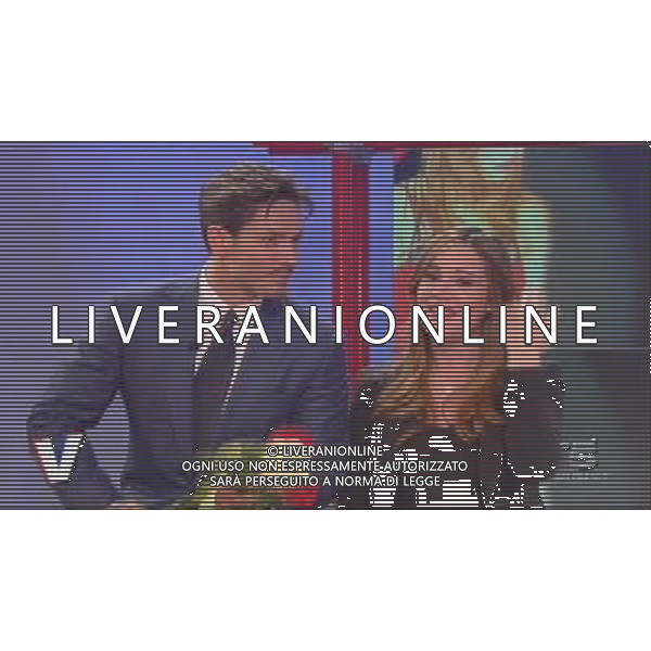 TRASMISSIONE TELEVISIVA\'VERISSIMO\' 17/04/2010 NELLA FOTO PIERSILVIO BERLUSCONI ENTRA NEGLI STUDI TELEVISIVI CON TRE ROSE PER SILVIA TOFFANIN ALL\'ULTIMA PUNTATA PRIMA DEL PARTO. IMMAGINI TELEVISIVE CANALE 5 OBBLIGATORIO CITARE LA FONTE TELEVISIVA AG ALDO LIVERANI