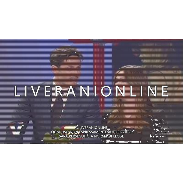 TRASMISSIONE TELEVISIVA\'VERISSIMO\' 17/04/2010 NELLA FOTO PIERSILVIO BERLUSCONI ENTRA NEGLI STUDI TELEVISIVI CON TRE ROSE PER SILVIA TOFFANIN ALL\'ULTIMA PUNTATA PRIMA DEL PARTO. IMMAGINI TELEVISIVE CANALE 5 OBBLIGATORIO CITARE LA FONTE TELEVISIVA AG ALDO LIVERANI