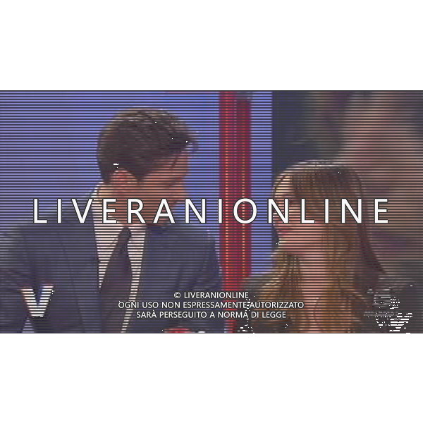 TRASMISSIONE TELEVISIVA\'VERISSIMO\' 17/04/2010 NELLA FOTO PIERSILVIO BERLUSCONI ENTRA NEGLI STUDI TELEVISIVI CON TRE ROSE PER SILVIA TOFFANIN ALL\'ULTIMA PUNTATA PRIMA DEL PARTO. IMMAGINI TELEVISIVE CANALE 5 OBBLIGATORIO CITARE LA FONTE TELEVISIVA AG ALDO LIVERANI