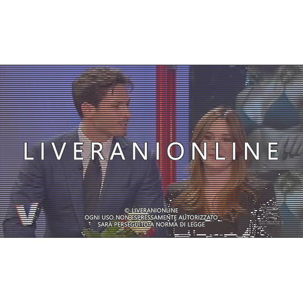 TRASMISSIONE TELEVISIVA\'VERISSIMO\' 17/04/2010 NELLA FOTO PIERSILVIO BERLUSCONI ENTRA NEGLI STUDI TELEVISIVI CON TRE ROSE PER SILVIA TOFFANIN ALL\'ULTIMA PUNTATA PRIMA DEL PARTO. IMMAGINI TELEVISIVE CANALE 5 OBBLIGATORIO CITARE LA FONTE TELEVISIVA AG ALDO LIVERANI