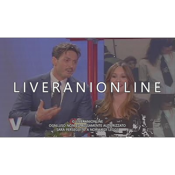 TRASMISSIONE TELEVISIVA\'VERISSIMO\' 17/04/2010 NELLA FOTO PIERSILVIO BERLUSCONI ENTRA NEGLI STUDI TELEVISIVI CON TRE ROSE PER SILVIA TOFFANIN ALL\'ULTIMA PUNTATA PRIMA DEL PARTO. IMMAGINI TELEVISIVE CANALE 5 OBBLIGATORIO CITARE LA FONTE TELEVISIVA AG ALDO LIVERANI