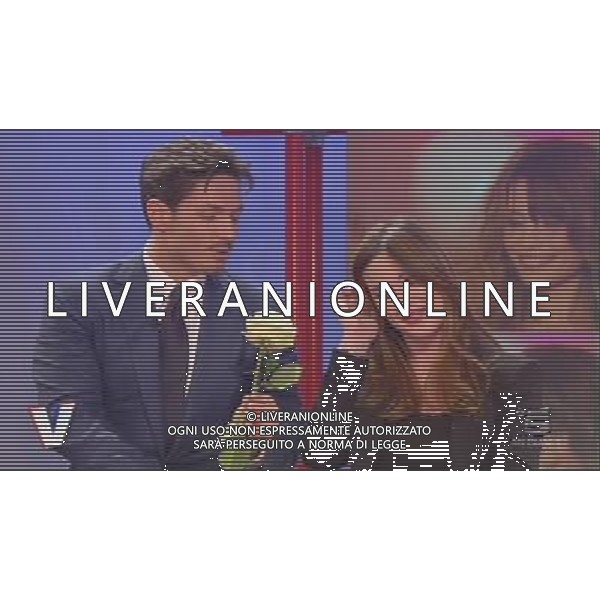 TRASMISSIONE TELEVISIVA\'VERISSIMO\' 17/04/2010 NELLA FOTO PIERSILVIO BERLUSCONI ENTRA NEGLI STUDI TELEVISIVI CON TRE ROSE PER SILVIA TOFFANIN ALL\'ULTIMA PUNTATA PRIMA DEL PARTO. IMMAGINI TELEVISIVE CANALE 5 OBBLIGATORIO CITARE LA FONTE TELEVISIVA AG ALDO LIVERANI