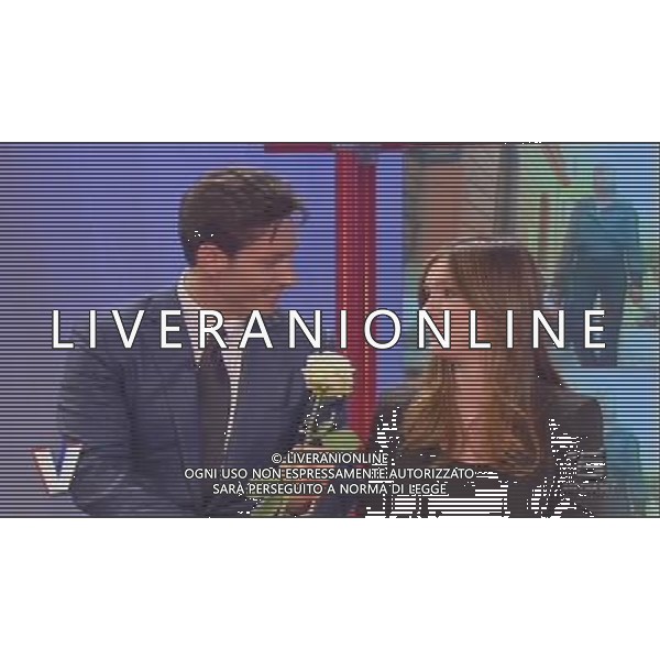 TRASMISSIONE TELEVISIVA\'VERISSIMO\' 17/04/2010 NELLA FOTO PIERSILVIO BERLUSCONI ENTRA NEGLI STUDI TELEVISIVI CON TRE ROSE PER SILVIA TOFFANIN ALL\'ULTIMA PUNTATA PRIMA DEL PARTO. IMMAGINI TELEVISIVE CANALE 5 OBBLIGATORIO CITARE LA FONTE TELEVISIVA AG ALDO LIVERANI